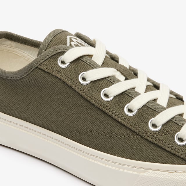 • Vulcanised sneakers • Soft canvas • Embroidered Diamond Logo • Suede overlays • Canvas overlay • Stitched sole • Toe box in rubber.