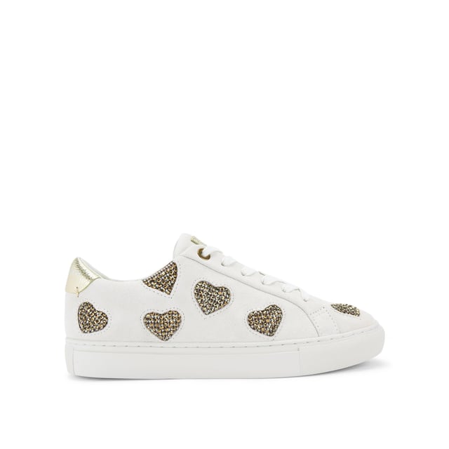 The Kurt Geiger Lane Love sneaker is crafted from a white leather with crystal embellished fabric hearts across the upper. There are two gold leather patches on the tongue and heel with gold foil branding.