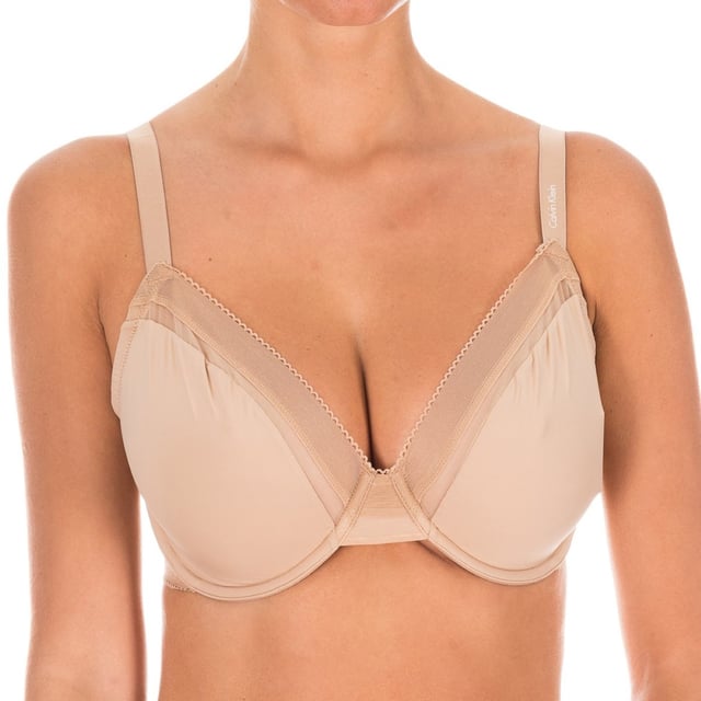 Calvin Klein bra. 
 Skin color. 
 Smooth cups without foam, with micro tulle at the top. 
 Cups with rings. 
 Elastic straps, adjustable. 
 Name of the brand stamped on one of the braces. 
 Elastic sides made of micro tulle. 
 Clasp closure on the back, three positions. 
 Seams seen in tone. 

 Composition: 76% Nylon. -24% Elastane. 

 Washing instructions: 
 - Wash maximum at 40ºC. 
 - Iron at medium temperature, max. 110 ° C. 
 - It does not allow to use dryer. 
 - Do not use bleach. 
 - Does not admit dry cleaning. 

 Size equivalence: 

 UK FR EU IT 
 30 80 65 30 
 32 85 70 32 
 34 90 75 34 
 36 95 80 36 
 38 100 85 38 


 Size equivalence: 

 UK FR EU IT 
 30 80 65 30 
 32 85 70 32 
 34 90 75 34 
 36 95 80 36 
 38 100 85 38