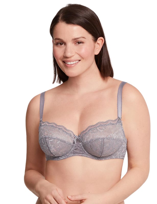 This beautiful support bra from Bestform is the ultimate must-have from the Lucia Harmony collection! Floral lace detailing runs around the entirety of this piece with scalloped edging dancing across the neckline, bringing attention to your breasts. Underwiring and padding make this bra super supportive and secure with a lifting effect adding to your voluptuous shape. The contrasting lace creates a 3D effect with a lot of depth which really boasts a top-class brand, further exaggerating this branding is a cute 'B' with hangs delicately below a bow that sits in between the two stunning cups. At the rear, you'll find a classic hook and eye closure with adjustability on the straps with allows you to alter them to your desired fit.

Underwired ultimate support
Adjustable straps
The classic hook and eye closure
Full cup coverage with scalloped edging
Floral detailing
Semi-sheer design
Everyday wear with a cheeky touch
Corset-style motif centred between the two cups, along with a bow and B branding
Country of origin: Vietnam
Composition: 80% Polyamide | 18% Elastane | 2% Polyester
Listed in UK sizes