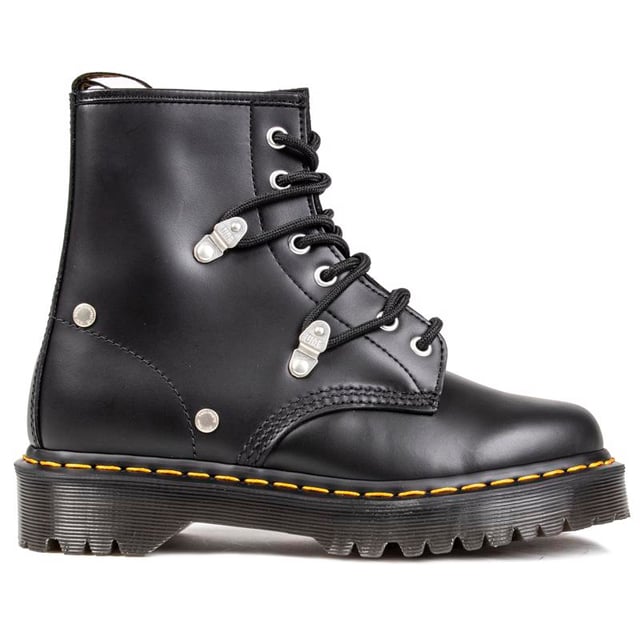 Women's Black Dr. Martens 1460 Pascal Lace-up Boots With A Leather Upper Featuring Standout Metal Studs And Loops Coordinating With 6 Eyelet Lacing System, And Signature Airwair Heel Loop. These Ladies' High-top Boots Have The Iconic Yellow Stitching And Goodyear Welted Air-cushioned Sole With Rugged Tread.