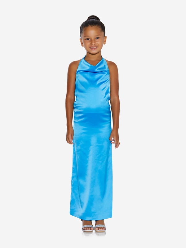 A special piece for special occasions, this girls blue halterneck dress from AY by Ayla is sure to turn heads. The longline silhouette boasts a sleek design which shines like tropical waters. Fun to wear and stylish to see, pair with dancing shoes for a party ready look. Halterneck Clasp Rear Zip Fastening Longline