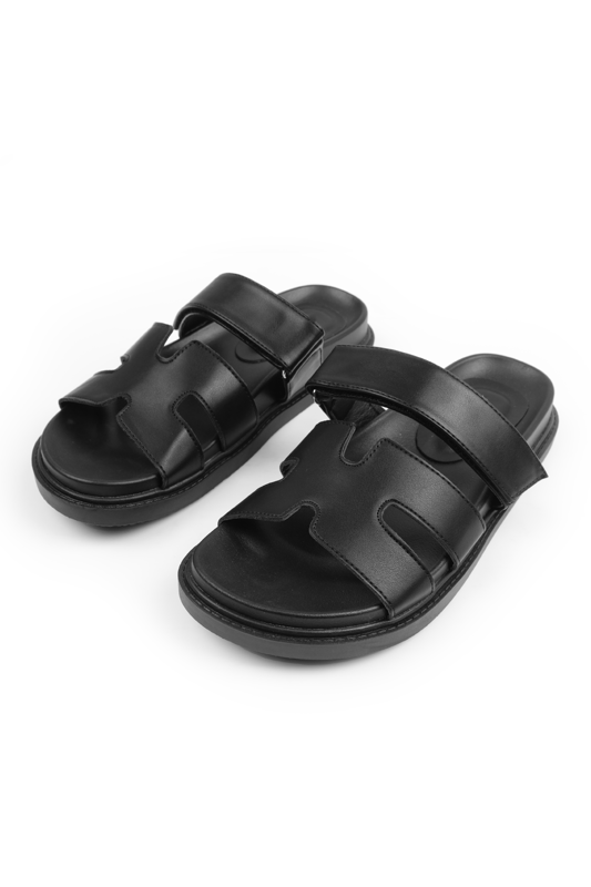 Step out in style with our Cut Out Strappy Slip On Flats in a fashionable and comfortable design. These flats are perfect for adding a touch of elegance to any outfit.
 
Key Features:


Chic Cut Out Design: The cut-out details create a stylish and unique look that sets these flats apart from ordinary slip-ons, adding a trendy and fashionable element to your ensemble.

Slip-On Style: The slip-on design allows for easy and convenient wear, making these flats a go-to option when you're on the go or need a comfortable yet fashionable shoe.

Comfortable Fit: These flats are designed to provide a comfortable fit with their soft and flexible construction, ensuring that your feet feel supported and relaxed throughout the day.

Versatile Style: The cut out strappy details and sleek silhouette make these flats versatile enough to be paired with a variety of outfits, from casual jeans to flowy dresses, for a sophisticated and put-together look.

Durable Construction: Crafted with high-quality materials, these flats are built to withstand regular wear and tear, ensuring their longevity and durability.

Cushioned Insole: The cushioned insole provides all-day comfort, allowing you to stay on your feet without any discomfort or fatigue.

Specifications:

Material: Faux leather
Colour: Available in multiple colours
Size Options: Available in multiple sizes
Closure: Slip-on style, Adjustable Strap
Sole: Rubber sole for comfort and traction

Invest in our Cut Out Strappy Slip On Flats and enjoy the perfect combination of style and comfort. These flats will elevate your outfits and leave you feeling effortlessly fashionable throughout the day.
Where's That From crafts footwear with the utmost care with YOU in mind. Our in-house unique designs offer the latest trends with supreme luxury comfort and unparalleled quality. Looking for ideas on how to put together an outstanding look? Follow our social media accounts for daily inspiration!