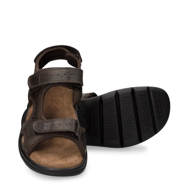 Introducing the Panama Jack Men's Leather Sandals Salton Basics, your perfect companions for outdoor adventures. Crafted with premium materials and superior craftsmanship, these sandals offer both style and functionality. Description: Experience ultimate comfort and convenience with the Velcro Closure and brown oiled Napa leather construction, ensuring a secure fit and timeless style. Enjoy a luxurious feel with Lycra lining and anatomical insole, providing cushioning and support for long walks and outdoor activities. Navigate any terrain with confidence, thanks to the flexible and durable polyurethane sole, offering stability and traction. Made in Spain, these sandals boast quality craftsmanship and attention to detail, ensuring long-lasting wear and reliability. Bullet Points: Velcro Closure for adjustable fitBrown oiled Napa leather construction for durability and styleLycra lining for added comfortAnatomical insole for enhanced supportFlexible and durable polyurethane sole for stability and traction
