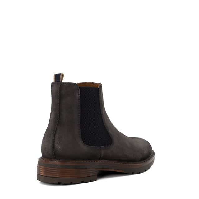 Dune Mens CHELTENHAM Casual Chelsea Boots Expertly constructed from the finest material, this timeless and traditional silhouette will provide a sartorial foundation to any wardrobe. Constructed with elastic side panels, a convenient back-pull-on tab, and a rubber sole for added comfort, our Cheltenham Chelsea boot fuses master craftsmanship with contemporary British styling.