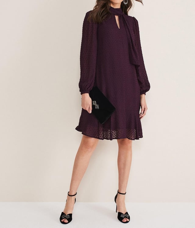• 100% Viscose Woven Lining: 100% Polyester • Tie neckline and long sleeves. Swing style/A line