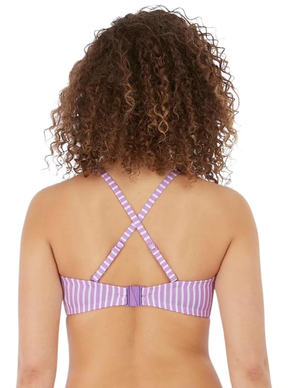 Freya's Beach Hut bandeau bikini top is versatile and chic, with adjustable straps that can be converted from straight to cross-over, or removed for the perfect look no matter what you are doing. The cups are underwired for support and lightly padded, giving your bust a smooth, round shape. The rear clip fastening will stay secure all-day long for worry-free wear. The chic knot detail and open-centre front design add a feminine, flirty touch.  Underwired, Lightly padded, Adjustable straps, Clip fastening, Front knot detail, Open-centre front, Removable, convertible straps, Country of origin: Sri Lanka, Composition: 69% Polyamide | 16% Elastane | 15% Polyester, Listed in UK sizes.   Bandeau Bikini Top