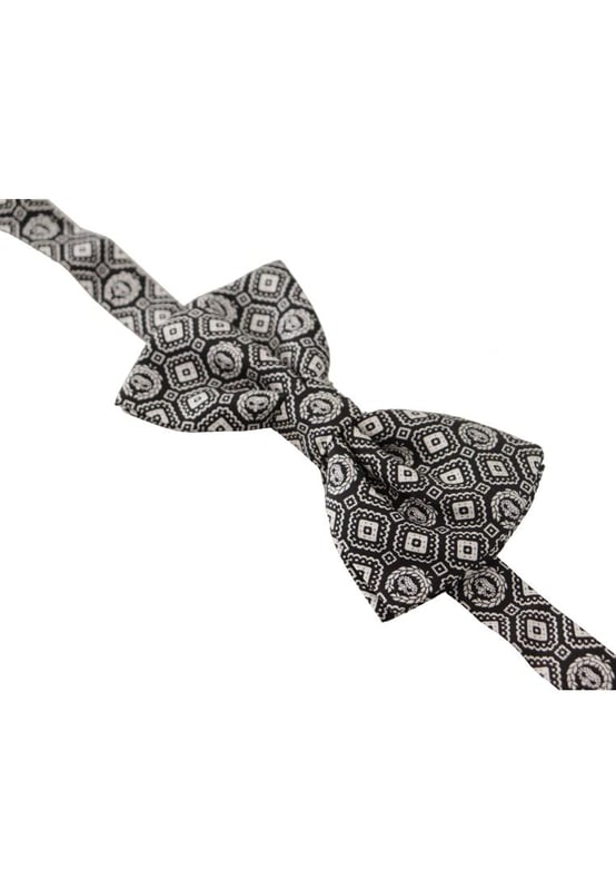 Stunning Dolce & Gabbana silk bow tie
  Brand new with tags
  Color: Black and White
  Model: Tied
  Material: 100% Silk
  Adjustable length neck strap
  One size
  Made in Italy
  Width: 7cm
Material: 100% Silk