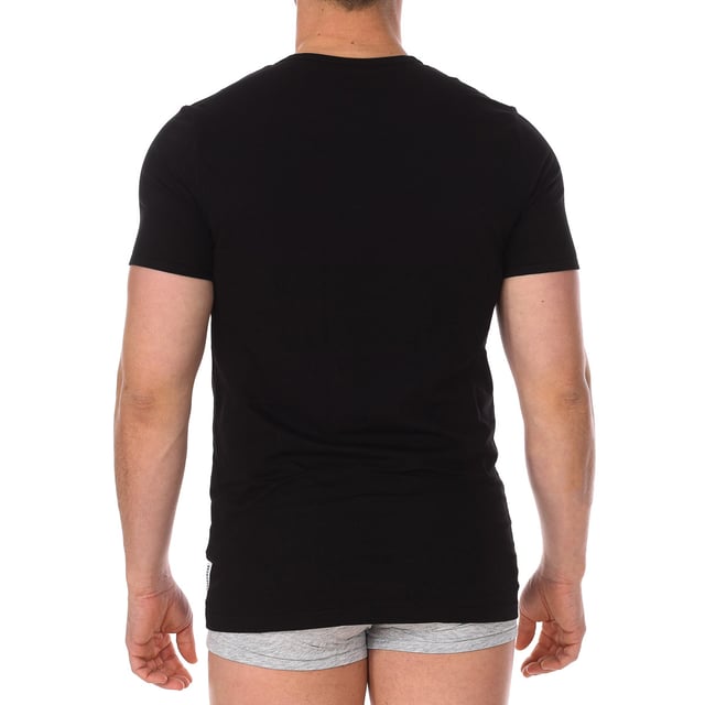 Bikkembergs short sleeve t-shirt.
 Color Black
 Round neck with ribbed finish.
 Fabric label personalized by the brand, on the upper side.
 Comfortable and breathable fabric.
 Seams seen in tone.

 Composition: 95% Cotton, 5% Elastane

 Care:
 -Wash at max temperature. 40ºC.
 -Do not use bleach.
 -Supports dry cleaning.
 -Allows you to use dryer.
 -Iron at max temperature. 130ºC.
 Composition: 95% Cotton, 5% Elastane
 Care:
Care:
 -Wash at max temperature. 40ºC.
 -Do not use bleach.
 -Supports dry cleaning.
 -Allows you to use a dryer.
 -Iron at max temperature. 130ºC.