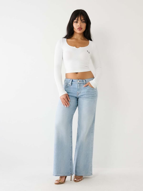 Relax your denim style with the Bobbi Baggy Jean. This relaxed fit women's baggy jean features fading, 3D whiskering, clean hardware, and classic gold stitching. Finished with 1/2" horseshoe detailing along the back pockets.    