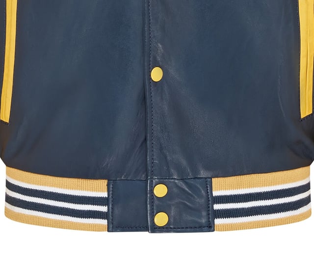 Introducing the Men's Baseball Leather Jacket, a perfect blend of classic varsity style and modern craftsmanship. This letterman bomber jacket features contrasting sleeves and a striped knit ribbed collar, waistband, and cuffs for a timeless athletic look. The press studs front closure and embroidered brand logo patches on the chest and sleeves add a touch of authenticity and flair. Designed with practicality in mind, it includes two jet pockets at the waist and two inside welt pockets for your essentials. The panelling to the back of the jacket ensures a tailored fit and superior comfort.

Contrasting sleeves for a stylish look
Striped knit ribbed collar, waistband, and cuffs for a classic finish
Press studs front closure for easy wear
Embroidered brand logo patches on the chest and sleeves for added detail
Two jet pockets at the waist and two inside welt pockets for convenience
