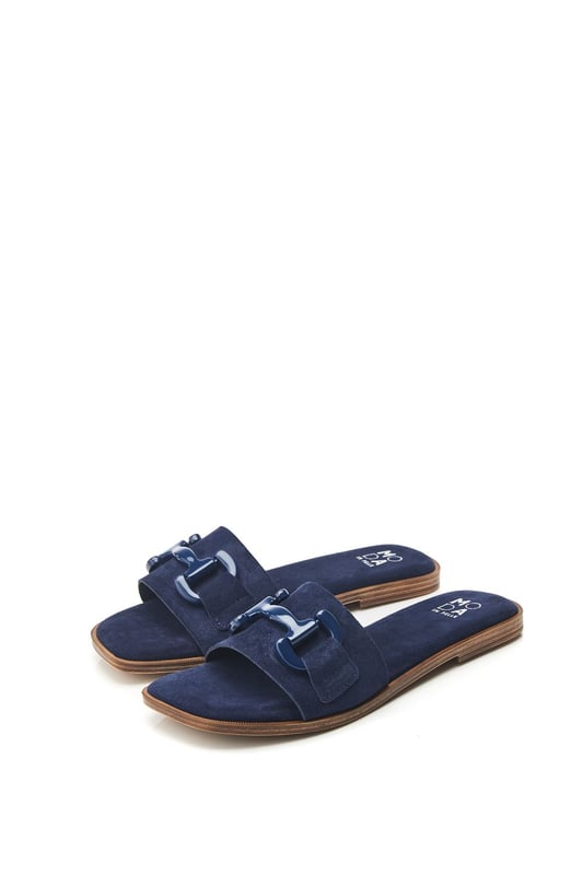 Obsess over Olayo. The perfect suede slip featuring metal trim. Pair with a summer dress or with a blazer for the perfect off-duty look.