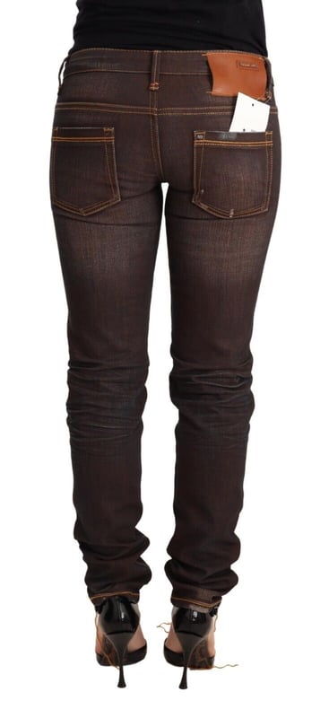 Brand: ACHT
  Condition: Brand new with tags
  Material: Cotton
  Style: Slim fit low waist skinny denim
  Color: Brown washed
  Closure: Zipper and button
  Details: Logo details
Material: Cotton