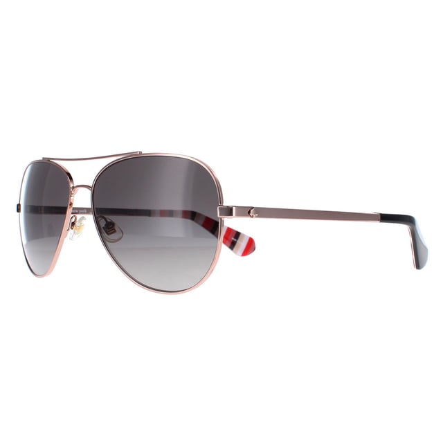 Las gafas de sol Kate Spade Avaline 2/S AU2 WJ polarizadas en degradado gris oro rojo son una elegante montura de aviador fabricada en metal ligero. Ya sea paseando por la playa o por las calles de la ciudad, estas gafas de sol son el compañero perfecto para cualquier ocasión. El logotipo de Kate Spade aparece en las patillas para garantizar la autenticidad de la marca.