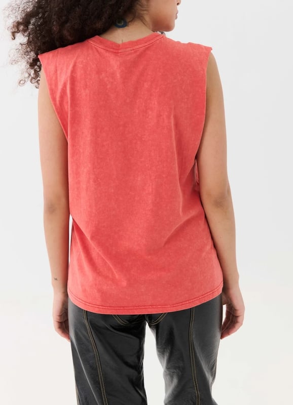 Relaxed fit, lightweight feel tank. Raw cut armholes. P.E Nation graphic on the front