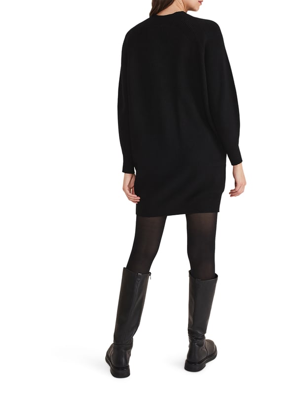 Stay cozy and stylish in the Eliana Jumper Dress, perfect for a casual day out or a comfortable evening at home.