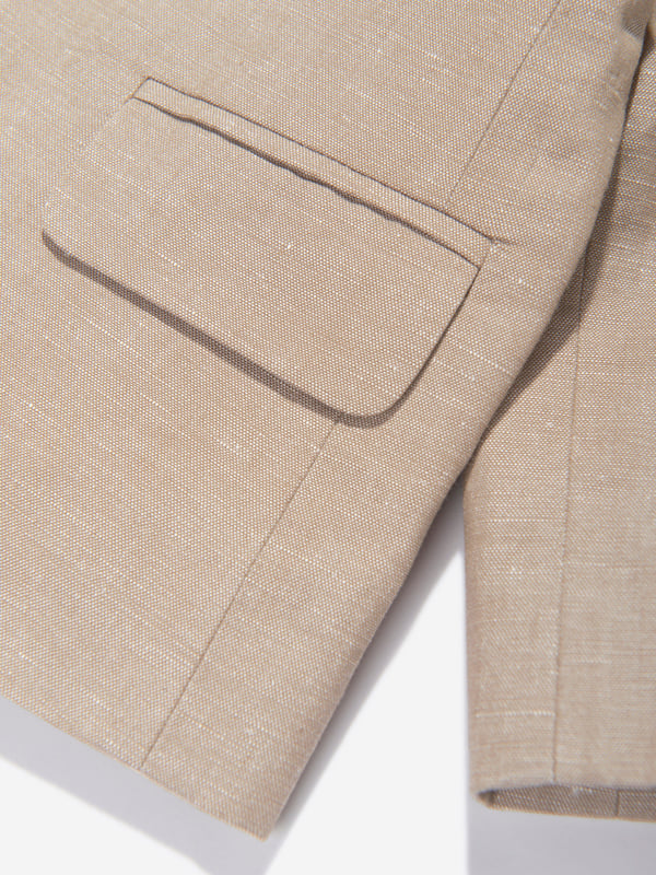 The Baby Boys Linen Leopold Blazer in Brown by Bonpoint is the ideal addition to your young one's wardrobe this Eid. Below are the defining features:Exquisite Design: With a unique print, this blazer makes a dashing statement, striking the right balance between trendy and timeless.Superior Comfort: Crafted from premium linen, it ensures your baby stays cosy and comfy, enhancing their festive experience.Elevate their attire with this linen blazer, adding a touch of luxury and elegance. Be the first to grab this must-have Bonpoint piece and let your little one shine!
