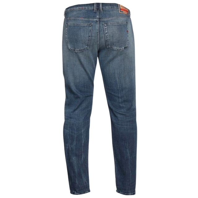 Pantalones vaqueros azules Diesel, bragueta con cremallera, 96 % algodon, 3 % elastomultiester, 1 % elastano-spandex, corte cenido, marca Diesel