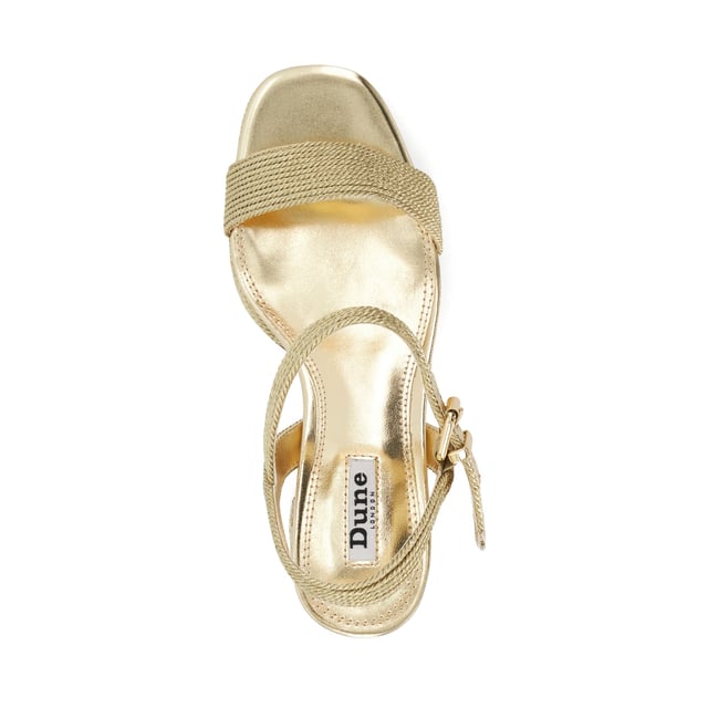 Give your look a glamorous edge with Kolden  metallic braided wedge sandals. Designed with a high wedge heel and a classic sandal toe  this style is ideal for weddings  weekend plans  and beyond. Featuring a gold-tone buckle closure and crossover straps.