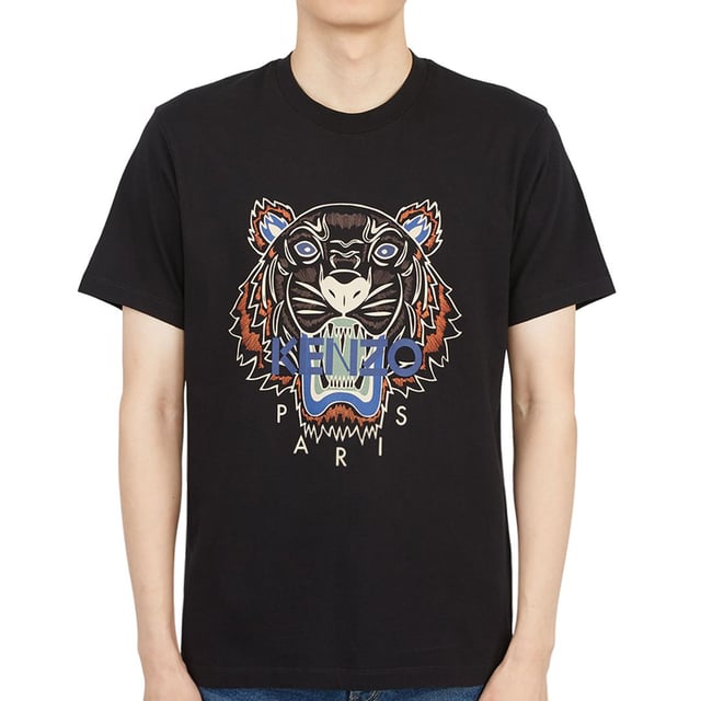This Classic Kenzo T-Shirt Features the Iconic Tiger and Logo Print as well as the Kenzo Paris Logo. Wear it for a casual/Sporty look with a pair of waist hugging trousers and trainers.