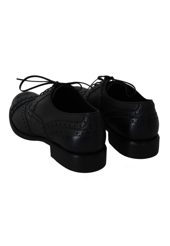 Brand: Dolce & Gabbana
  Model: Derby Taormina wingtip dress formal
  Color: Dark Blue
  Material: 100% Leather
  Leather and rubber sole
  Logo details
  Made in Italy