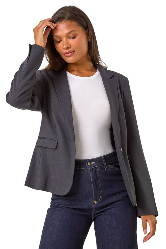 Tailored Single Breasted Blazer from Roman. Be the classiest on your next occasion with our tailored single-breasted jacket. Designed with a smart collar and rever front opening, this long-sleeve jacket features functional front flap pockets and a button fastening for a timeless look. Fully lined for warmth and tailored for a flattering silhouette. Pair with wide-leg trousers and heels for a sophisticated look!