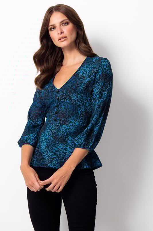 REASONS TO BUY


Because you always have room in your wardrobe for animal print
Peplum waist creates the perfect silhouette
Plunging V-neck, perfect for all bust sizes
Button detail for a luxe look
Effortlessly chic
Pair with black jeans or cropped trousers to nail the ‘jeans and a nice top’ dress code
