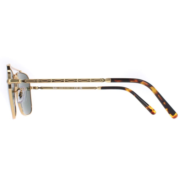 Ray-Ban Square Unisex Gold Green RB3636 New Caravan  Sunglasses are a sleek and sophisticated square silhouette that echoes retro charm with a modern twist. Crafted with precision, the metal frame offers durability and style, while the carefully selected lenses provide both clarity and UV protection. The distinct yet versatile design of the RB3636 new square sunglasses makes them a must-have accessory, elevating any ensemble with their timeless appeal and hint of modern sophistication, ideal for those seeking iconic style fused with functionality and quality craftsmanship.
