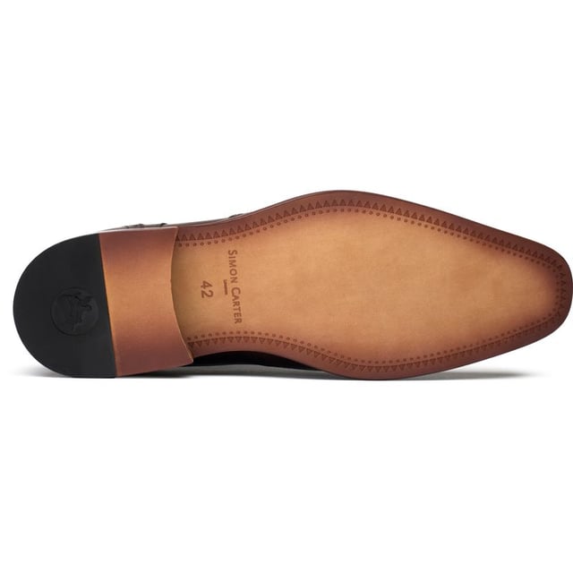 The Simon Carter Beagle Brogues Showcases A Perfect Blend Of Classy, Timeless Sophistication And Captivating, Daring Details. These Polished Shoes Redefine Sharp Styling With Their Unique Accents. Crafted From Premium Leather And Exclusive To Sole, The Simon Carter Shoes Ooze Personality And Uniqueness With Their Sleek And Elegantly Edgy Design. Whether Dressing For A Go-to-meeting, A Night Out Or Adding A Sharp Edge To Your Daily Attire, This Quintessential British Simon Carter Staple Ensures You Make A Distinctive Statement Of Style, Design And Personality.