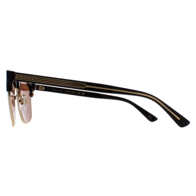 Gucci Rectangle Mens Silver Grey GG1648S  Sunglasses are a testament to the brand's timeless elegance and fashion forward vision. These sunglasses seamlessly blend classic design with contemporary flair, featuring a rectangle shaped frame that exudes sophistication. The brand's logo is discreetly integrated into the sleek temples, showcasing the unmistakable mark of Gucci craftsmanship.