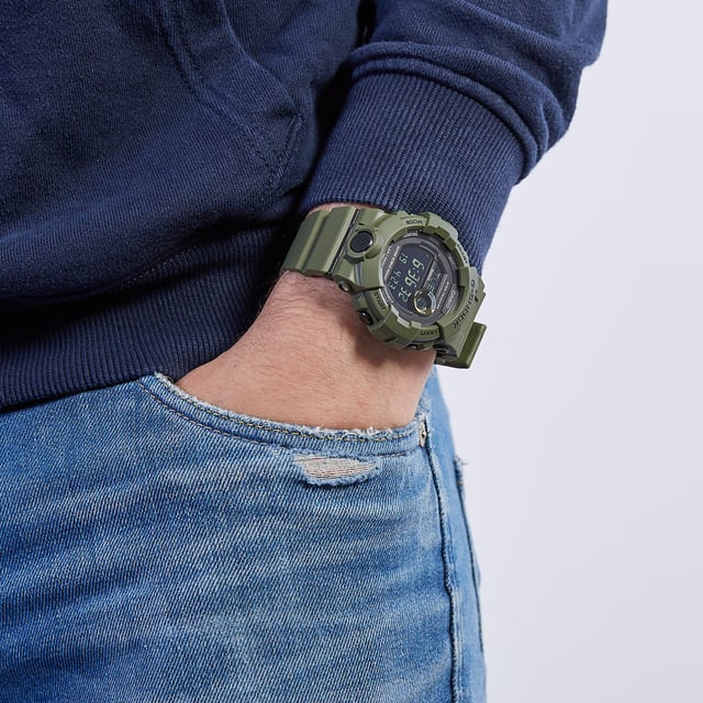 This Casio G-shock Digital Watch for Men is the perfect timepiece to wear or to gift. It's Green 48 mm Round case combined with the comfortable Green Plastic watch band will ensure you enjoy this stunning timepiece without any compromise. Operated by a high quality Quartz movement and water resistant to 20 bars, your watch will keep ticking. This sporty and fashionable watch gives you a unique feeling in every outfit! -The watch has a calendar function: Day-Date-Month, Bluetooth, Stop Watch, Countdown, Dual Time, Alarm High quality 21 cm length and 19 mm width Green Plastic strap with a Buckle Case diameter: 48 mm, case thickness: 14 mm, case colour: Green and dial colour: Black