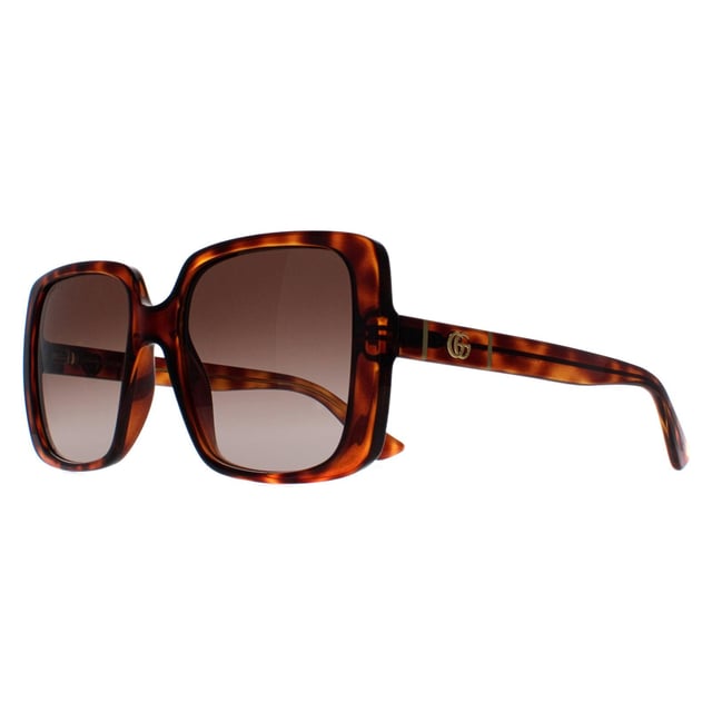 Gucci Square Womens Dark Havana Brown Gradient GG0632S  Sunglasses are a modern square frame that effortlessly complements any outfit. The frame is made from high-quality acetate, renowned for its durability and lightweight nature, ensuring a comfortable fit. Gucci's logo features on the slender temples for brand authenticity.