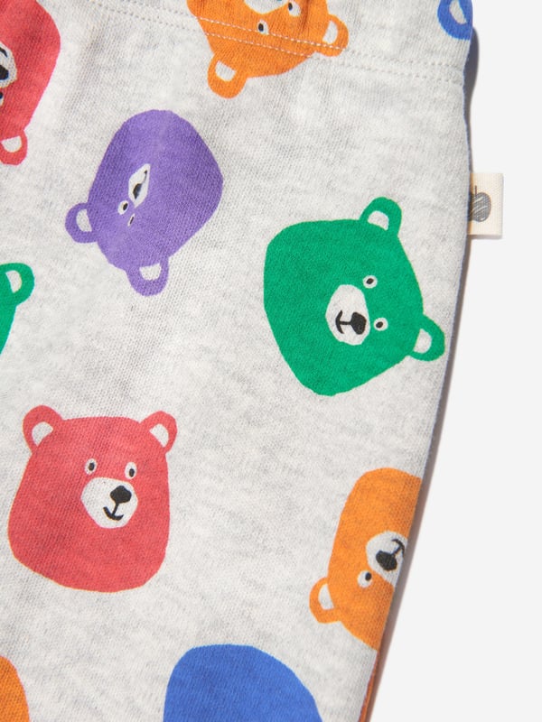 The Bonnie Mob depict passion and colour into their eco-friendly, sustainable abstracts. These baby unisex Harem trousers are depicted on a light grey base with teddy bear patterning in soft cotton via an elastic waist and ribbed cuffs for a cute versatile feel.  100% GOTS Certified Organic Cotton GOTS Certified Organic Brand Cotton Jersey