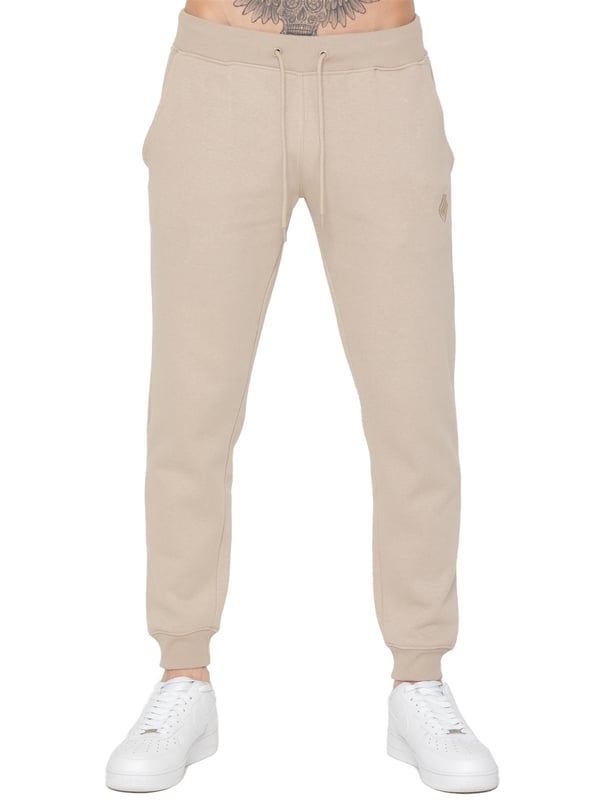 Upgrade your casual wardrobe with these Men's Slim Fit Joggers from Only. Designed for both comfort and style, they feature an elasticated waist with a drawstring for a customizable fit. The Enzo logo is elegantly embroidered on the leg, adding a touch of refinement. With a practical 2-pocket design and fleece lining, these joggers combine functionality with warmth, making them perfect for everyday wear.