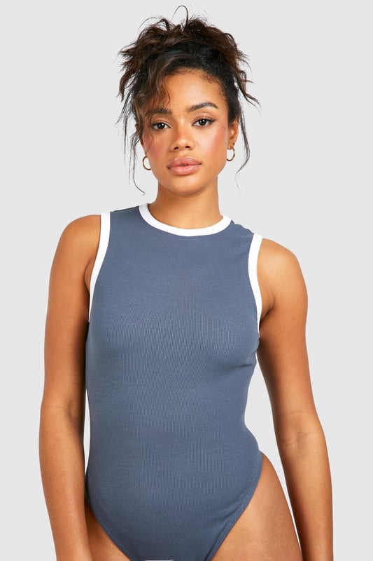 Heading somewhere that requires a little more glam? Sleek, sexy, and the perfect addition to your new-season wardrobe, this is the going out bodysuit you've been searching for. An all-in-one garment featuring a seamless finish for that perfect fit, this evening bodysuit has serious add-to-bag potential. From sequin bodysuits to lace styles, just pair with your fave jeans and killer heels for a date-night ready look or swap out for a skirt and boots combo, cute.Style: BodysuitDesign: ContrastFabric: Ribbed JerseyLength: RegularNeckline: Racer NeckSleeve Length: SleevelessModel's height: 175cm / 5'9"