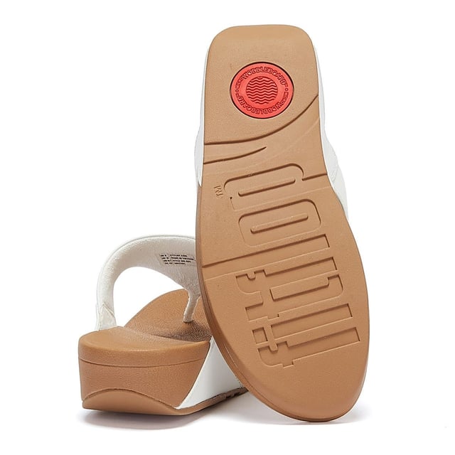 The minimalist Lulu sandals from FitFlop feature a timeless fabric-lined triangular vamp, along with legendary ergonomic Microwobbleboard™ midsoles, which deliver extraordinary comfort by not only absorbing shock but by diffusing underfoot pressure. This iteration boasts softly padded leather uppers for a classic finish.
