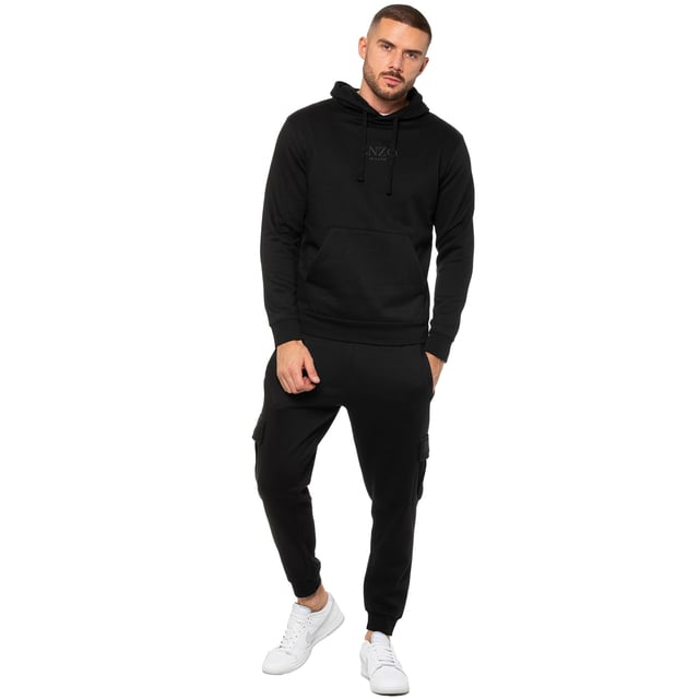 Enzo Mens Regular Fit Cargo Joggers. Features 2 Side Slash Pockets, 2 Cargo Pockets, Single Welt Back Pocket. Brushed Back Inner Fleece. Elasticated Waistband With Adjustable Drawstring. Cuffed Ankle. Features EZ Logo.