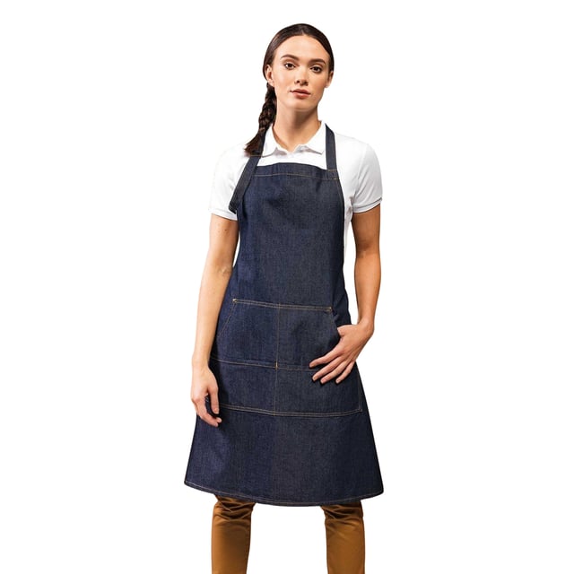 Pack of 2. Denim bib apron with contrast stitching. Adjustable buckle on the neckband. Copper rivets. Four pocket compartments. 86cm long and 72cm wide. Washing Instructions Domestic wash 60c, Industrial laundry 85c. Fabric 70% Cotton, 30% Polyester twill.