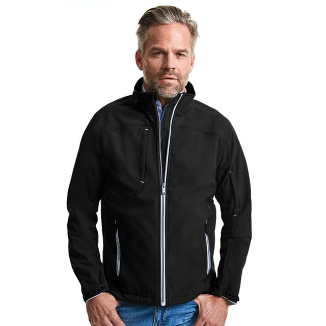 Softshell jacket with a timeless design. Highly water and wind resistant. Contemporary shaped fit. Contrasting zips and accents for a refined look. Covered zipped pockets: one at chest and one at sleeve. Protecting chin guard. Stand-up collar and inner storm flap to ward off wind and draught. Adjustable sleeve hems with injected cuff tabs and loop touch fastening. Materials: 94% Polyester, 6% Elastane.