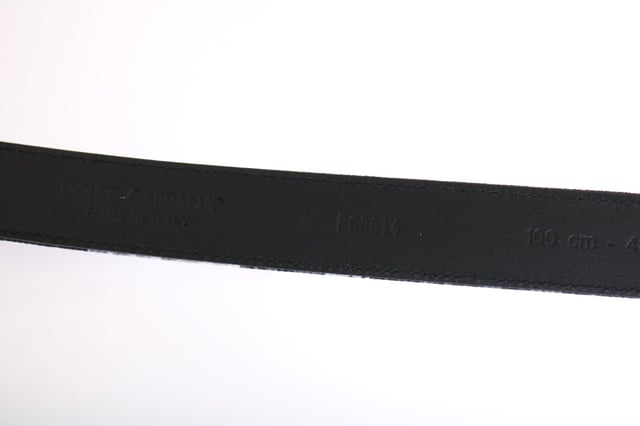 Dolce & Gabbana Belt
  Gorgeous brand new with tags 100% Authentic Dolce & Gabbana MENS Belt
  Color: Black with floral pattern
  Buckle: Gold metal detachable
  Material: 50% Cotton 10% Cayman leather 40% Linen
  Width: 2.5 cm
  Logo details
  Made in Italy
Material: 50% Cotton 10% Cayman leather 40% Linen