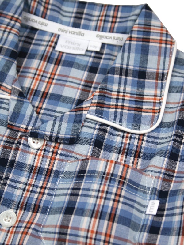Introducing our charming Boys' Shortie Traditional Cotton Check Pyjamas, the perfect blend of comfort and classic style for your little man's bedtime adventures! Made from premium cotton fabric, these shortie pyjamas ensure a cool and cosy sleep experience during warm summer nights.

Key Features:

