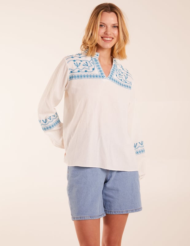 This delicate embroidery puff sleeve blouse brings a touch of elegance to your everyday wardrobe - we love wearing it with light denim. 
100% Cotton