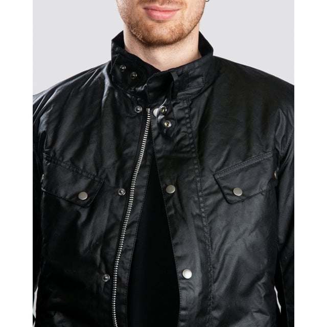 A mainstay of the World Tour collection, the Duke is a re-work of the iconic Enfield jacket in a winter-ready waxed cotton.
With biker styling and a robust construction, the Duke is crafted in Barbour&rsquo;s 6oz Thornproof wax for durable protection with a lustrous finish, complete with a two-way zip and hardy studded storm fly front. A quilted nylon lining adds warmth, while the cosy funnel collar and stud-fastening cuffs boast a contrast corduroy lining for incredible softness and a signature Barbour look.
Paying homage to Barbour&rsquo;s motorcycle heritage, authentic detailing includes elbow patches, four studded pockets and a collar strap. The lower bellow pockets feature a stylish pleat and are generously proportioned to carry essentials without adding bulk, while a zipped inner pocket safeguards valuables. Available in four versatile colours with the Barbour International badge to the sleeve, the Duke is subtly tailored with a relaxed fit ideal for winter layering.

Back length: 28.5–32" | 71.5–81.5cm
Mediumweight 6oz Thornproof wax outer
Sponge clean only