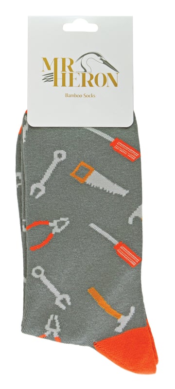 Are you looking to get yourself some new socks for Spring or Summer but you’re sick of the boring plain colours out there? Well these great Novelty Bamboo Tools Socks are perfect for you if you’re a big DIY man! These socks will keep your toes warm, comfy and very breathable with the natural bamboo fibres which is known for being super soft. The bamboo not only makes them super soft and breathable but it is ideal for sensitive skin. These colourful bamboo socks come in unique designs of classic working tools like saws, hammers, screwdrivers and are available in grey with an orange heel & toe design. They would even make a brilliant gift for Birthdays or even Christmas! Mr Heron prides their products on the philosophy of making your feet feel fabulous all year round. Whether it's their chic and stylish products, they bring you unique, exciting and fashionable accessories, full of individuality to give you the confidence to be you. This range of socks are made from 51% Bamboo, 20% Cotton, 19% Polyester, 8%Polyamide, 2% Elastane. They are Men’s sizes 6-11 UK. Machine washable under 40. Do not dry clean. Do not iron. Do not bleach.