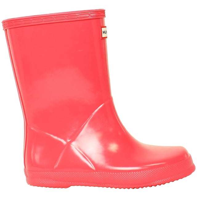 Let your child make a splash in style with the Hunter Gloss Kids Pink Wellington Boots. These boots are a miniature version of the iconic adult style, offering the perfect blend of functionality and fashion. The glossy finish adds a touch of sophistication to the classic design, making them a must-have for every young trendsetter.

Key Features:

 Glossy Finish:  The standout feature of these boots is the glossy exterior, adding a chic and stylish element to the classic Wellington design. The shiny pink hue makes these boots a fun and fashionable choice for rainy days.

 Durable and Waterproof:   Crafted from high-quality rubber, these boots are built to withstand the elements. The waterproof construction ensures that your child's feet stay dry and comfortable, making them suitable for various outdoor activities.

 Comfortable Interior:   Designed for all-day wear, the boots feature a comfortable interior with a cushioned insole. Your child can enjoy extended playtime without sacrificing comfort, making these boots ideal for both casual outings and outdoor adventures.

 Easy to Wear:   The pull-on style and adjustable strap make these boots easy for kids to put on and take off independently. The wide opening and pull tabs enhance convenience, allowing for hassle-free dressing.

 Sturdy Grip:   The slip-resistant sole provides excellent traction on different surfaces, ensuring stability in wet and slippery conditions. These boots are designed to keep your child sure-footed while exploring the outdoors.

 Reflective Logo:   For added safety, the boots feature a reflective Hunter logo. This detail enhances visibility in low-light conditions, making them a practical choice for early morning or evening activities.

 Iconic Branding:   Showcasing the iconic Hunter logo on the front, these boots maintain the brand's reputation for quality and style. The pink color adds a playful touch, making them a versatile and eye-catching accessory.

Elevate your child's rainy-day wardrobe with the Hunter Gloss Kids Pink Wellington Boots â€“ a perfect combination of style, durability, and functionality that brings a pop of color to outdoor play.