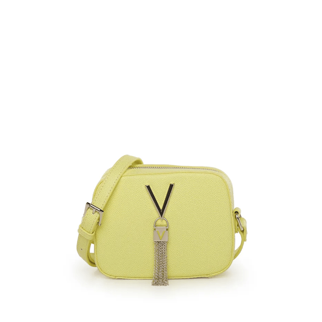 Discover essential elegance with Valentino's latest addition: a shoulder bag perfect for adding style to every moment of yours, from a stroll to brunch with friends. A chic design with softly rounded corners and a practical top zipper ensures a secure closure, keeping contents always within reach. Think of the convenience of an adjustable strap that fits you, long or completely detachable to transform it into an elegant clutch. A tassel that sways with your step adds that extra touch. And for your little treasures? The internal lining will safeguard every precious item. With this Valentino bag, you're ready to face the day with style and elegance! Size 13 x 17 x 3 cm