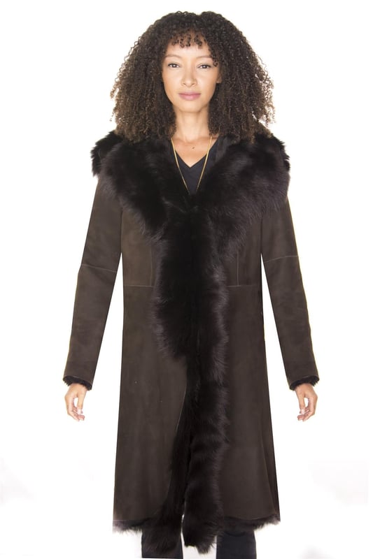 A testament to the luxury appeal of sheepskin, this slim fit jacket is proudly manufactured in our London factory by our veteran craftsmen. This coat comes in 8 of our finest colourways and is characterised by the generous exposure of sheepskin at the front for an extravagant and classy look. This jacket comes with a pocketless finish and the seams at the jacket edges are all left natural for a classic look. We’ve crafted this jacket from Spanish Toscana wool which is renowned for being among the most soft and silky sheepskins and the result is a jacket which is unquestionable in terms of quality and unparalleled in its provision of warmth and comfort. Upon request we can make this jacket in any length that you wish to ensure that you can enjoy this piece to its fullest potential, please feel free to contact us by email. • Crafted from high-quality double-faced sheepskin • Thick sheepskin lining is renowned for providing warmth and comfort • Features a luxurious revere collar that fastens with hooks and loops • Available in 8 different colours • Custom orders for different jacket lengths are available upon request