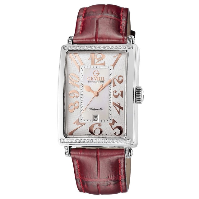 Creating a synergy of technical innovation and striking beauty, this diamond accented women's automatic timepiece from Gevril Glamour blends a bold watch face with feminine details. The bezel is framed   with gorgeous white Top Wesselton diamonds. The watch also offers a bevy of small artistic flourishes including a uniquely patterned guilloche dial and a highly stylized rose gold tone Arabic numeral display that is raised off the surface of the dial.   A mother of pearl with a pink center dial includes a three-handed movement and date window above 6 o'clock. It's completed by a n attractive red crocodile leather strap with tonal stitching accents. Other features include scratch resistant sapphire crystal, and water resistance to 150 feet.Creating a synergy of technical innovation and striking beauty this diamond accented women's automatic timepiece from Gevril Glamour blends a bold watch face with feminine details. The bezel is framed   with gorgeous white Top Wesselton diamonds. The watch also offers a bevy of small artistic flourishes including a uniquely patterned guilloche dial and a highly stylized rose gold tone Arabic numeral display that is raised off the surface of the dial.   A mother of pearl with a pink center dial includes a three-handed movement and date window above 6 o'clock. It's completed by a n attractive red crocodile leather strap with tonal stitching accents. Other features include scratch resistant sapphire crystal and water resistance to 150 feet.