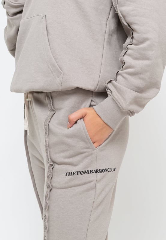 Tom Barron Dames trainingspak met kwart rits en logo in oversize