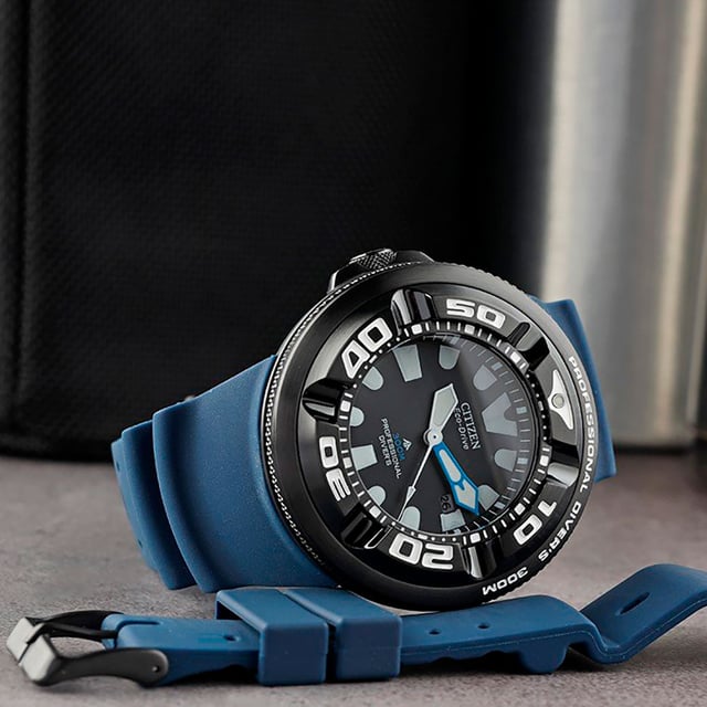 This Citizen Promaster Marine Analogue Watch for Men is the perfect timepiece to wear or to gift. It's Black 48 mm Round case combined with the comfortable Blue Plastic watch band will ensure you enjoy this stunning timepiece without any compromise. Operated by a high quality Eco-Drive movement and water resistant to 30 bars, your watch will keep ticking. This Eco-Drive watches recharges itself in any kind of light, to run forever. This Eco-Drive watch does not require any battery replacement, charging or winding to maintain constant operation This Analogue watch has a calendar function: Date , Solar Powered , Luminous Hands , Luminous Numbers and Screw Down Crown. Comes with a extension strap High quality 21 cm length and 26 mm width Blue Plastic strap with a Buckle Case diameter: 48 mm,case thickness: 18 mm, case colour: Black and dial colour: Black